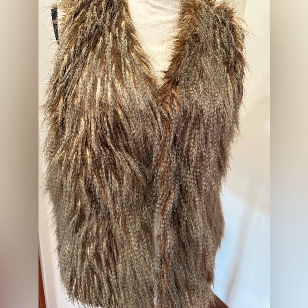 Faux fur vest with hook and eye closure